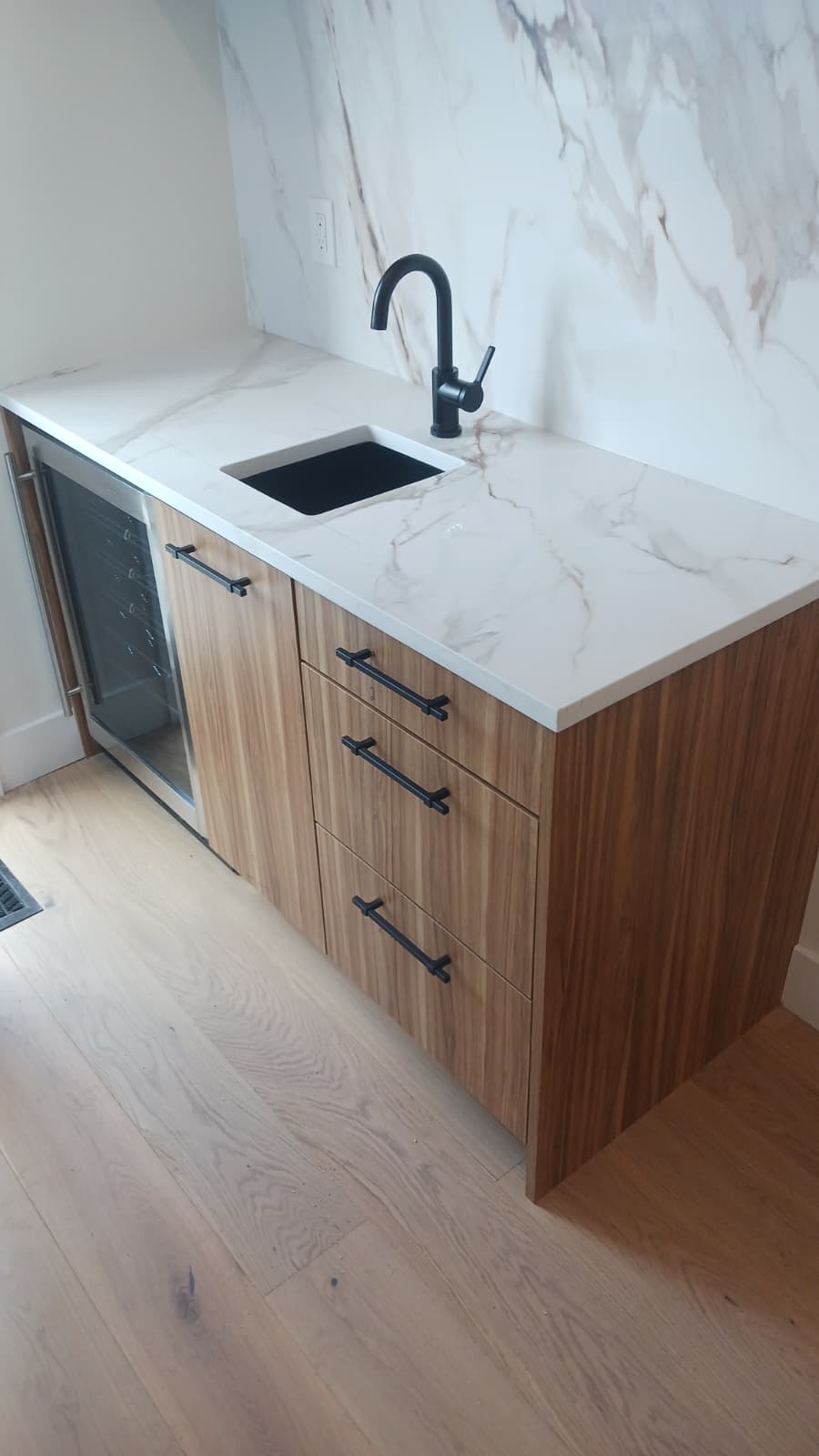 A custom dry bar designed to add style, storage, and functionality to this Philadelphia home.